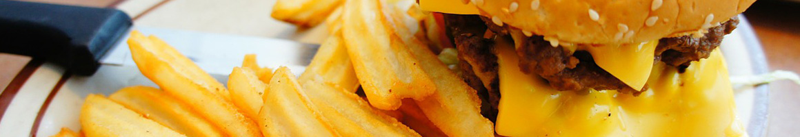 Eating Burger at Yellow Basket Restaurant.